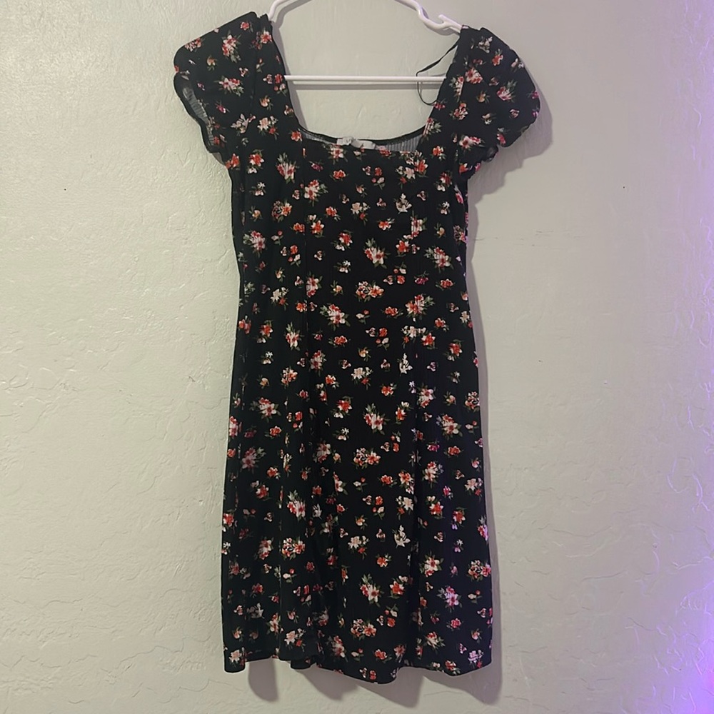 Small black dress with red and light pink floral print. slightly flowy